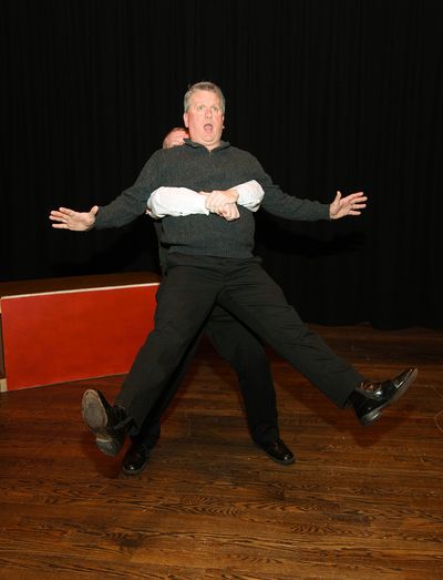Charley Wykeham (Paul Michel) pulling Lord Fancourt Babberly (Steve Dincau) out of wi Photo