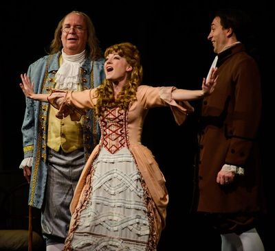 Meredith Beck as Martha Jefferson as Ben Franklin and John Adams look on Photo