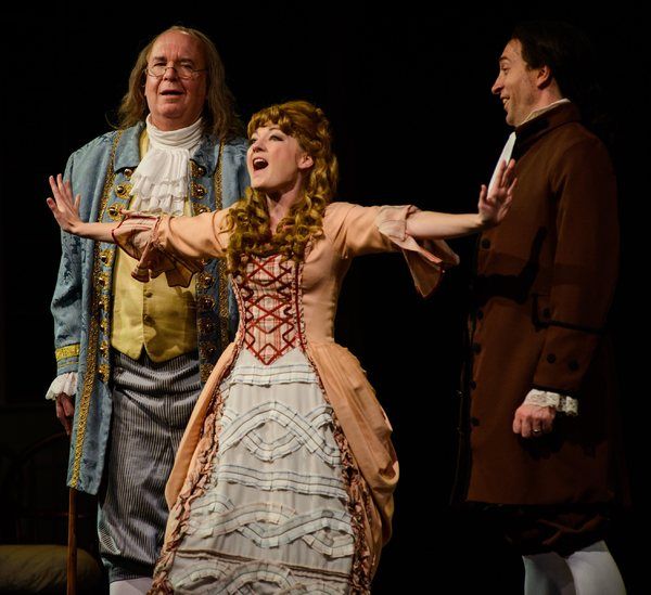 Meredith Beck as Martha Jefferson as Ben Franklin and John Adams look on Photo