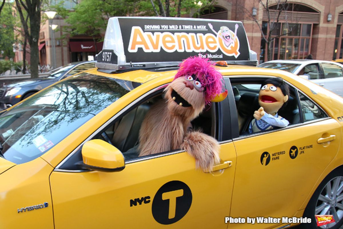  Trekkie Monster drives a New York City 'Avenue Q'  Taxi with Princeton as his passenger at 