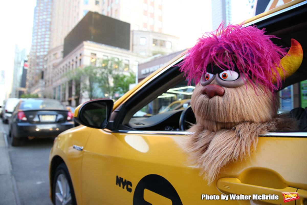   Trekkie Monster drives a New York City  Trekkie Monster drives a New York City 'Avenue Q'  at 