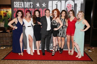 Center, Director Brian Kite poses with the cast of AMERICAN IDIOT Photo