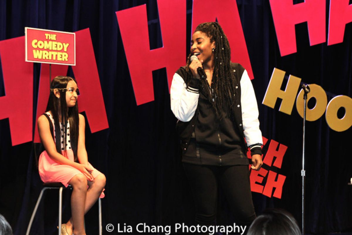 Project member Magalis Fabian Vinas, age 11, in the Comedy Writer chair while Jessica Williams performs Magalis' stand-up. at 