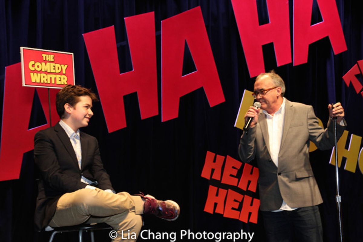 Project member Milen Tokarev, age 13, in the Comedy Writer chair while John Bowman performs Milen's stand-up. at 