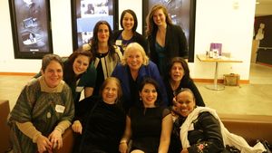 Hardworking staff and volunteers relax at the end of a long night. Photo by Lizzy Bry Photo