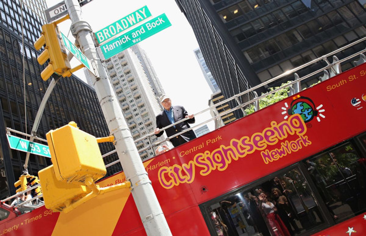Lyricist Sheldon Harnick poses for a photo next to the 'Harnick and Bock Way' street sign at 