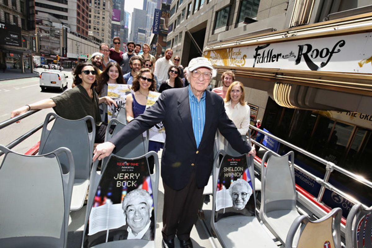 Lyricist Sheldon Harnick poses for a photo with the Broadway cast of FIDDLER ON THE ROOF at 