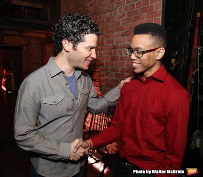 Thomas Kail greets a student performer Photo