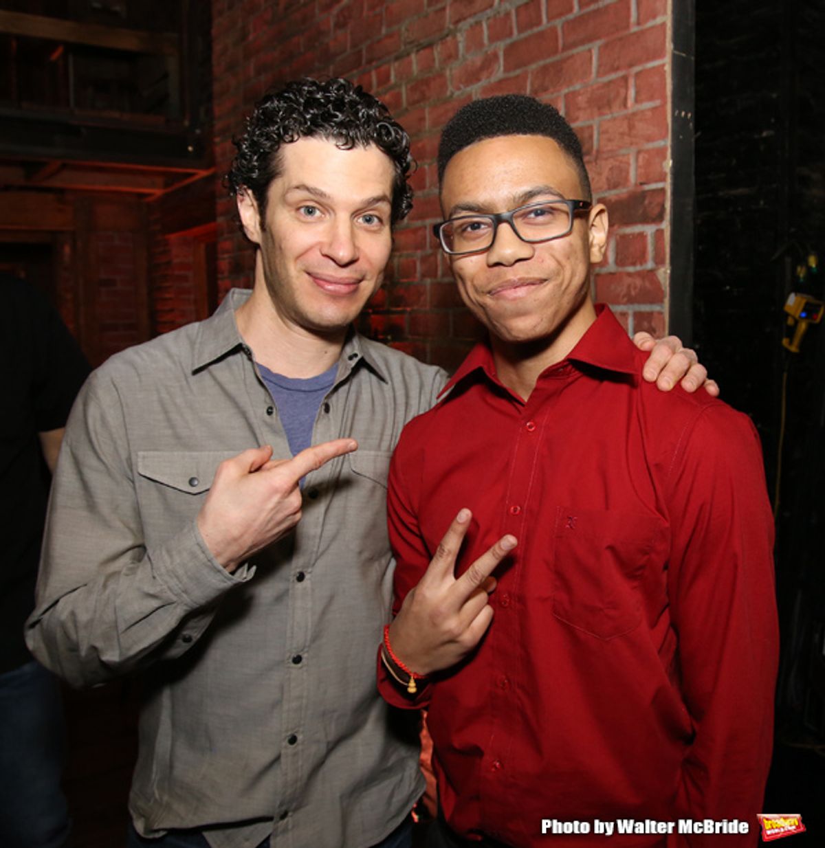 Thomas Kail greets a student performer at 