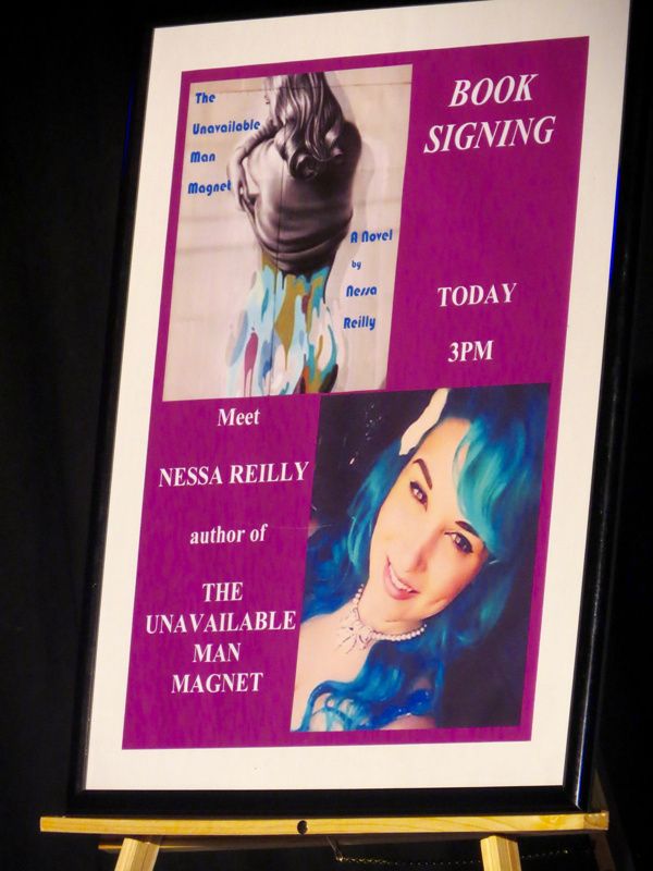 In 'The Unavailable Man Magnet' the audience gets a very personal book signing with n Photo