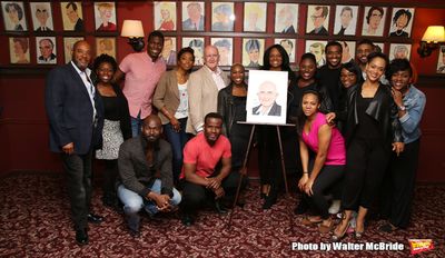John Doyle with the cast  Photo