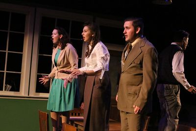 Ann Hier, Victoria Valentine, and Sean Michael, singing "The Atomic Bomb is Here," in Photo