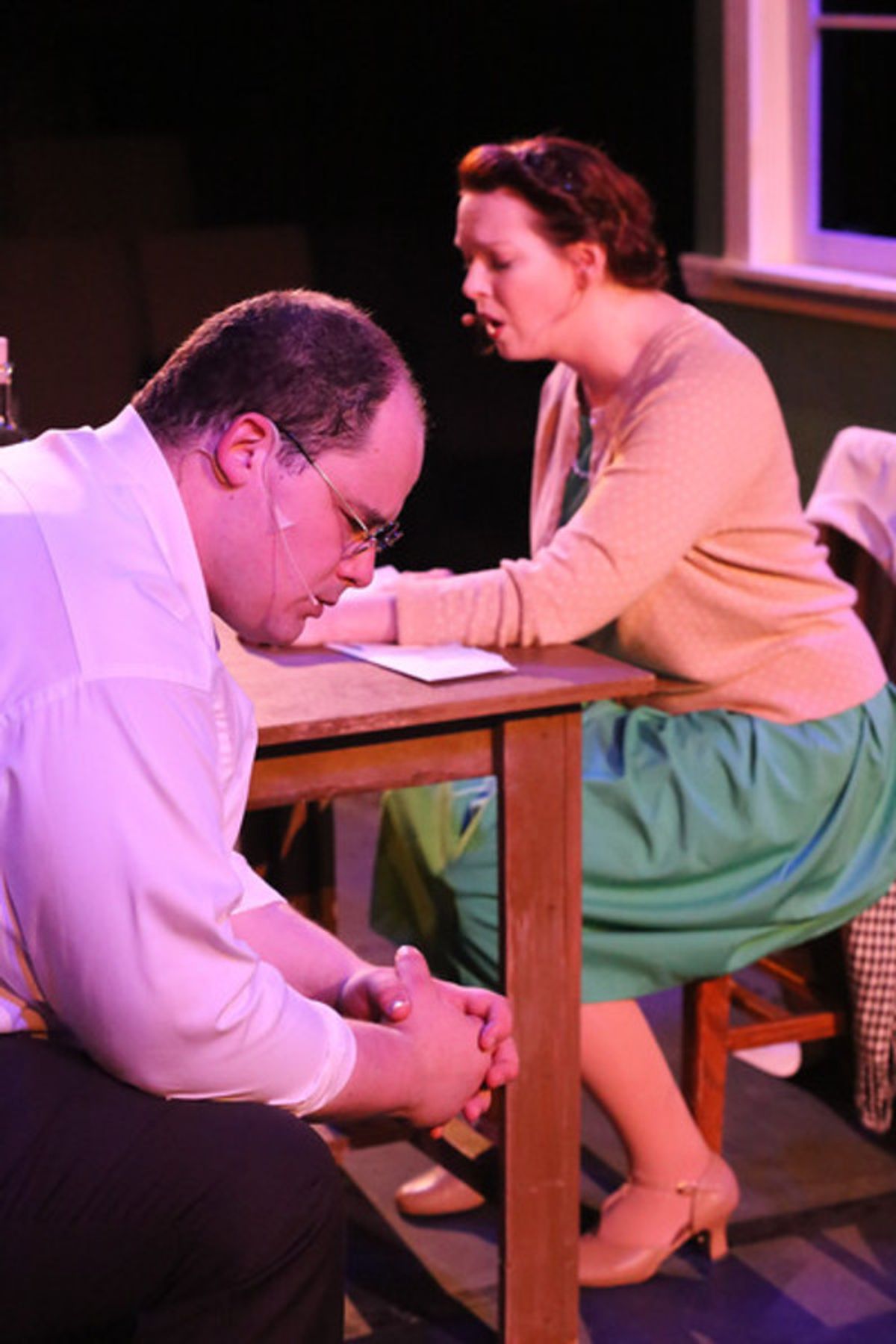 Zachary Allen Farmer as Leo Szilard and Ann Hier as Trude Weiss, singing 'Where is Home?', in New Line Theatre's ATOMIC. Photo credit: Jill Ritter Lindberg. at 