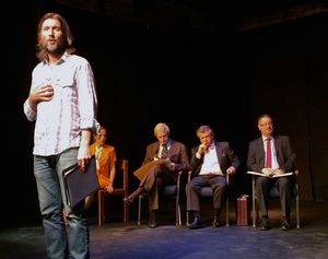 John Denver (Scott Nelson) speaks his mind as the committee considers his words. — with Don Schlossman. @ BroadwayWorld John Denver (Scott Nelson) speaks his mind as the committee considers his words. ⿠Photo