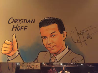 Christian Hoff's caricature on the Palm West's new Tony wall Photo