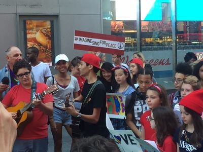 Young people from the Broadway community sing John Lennon's 'Imagine' for peace Photo