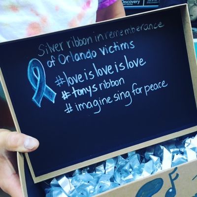 Young people from the Broadway community sing John Lennon's 'Imagine' for peace Photo