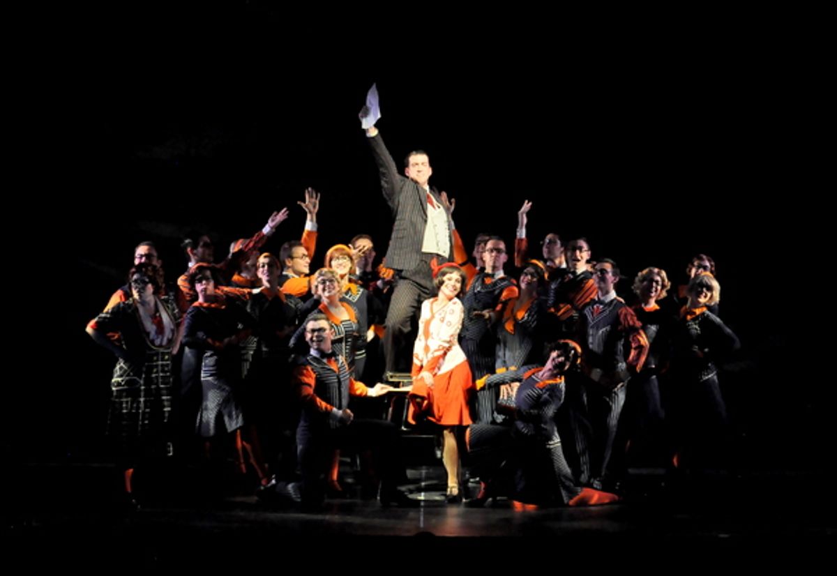 Gabi Carrubba as Millie and Mark Linehan as Trevor Graydon (center) and ensemble perform 'The Speed Test' at 