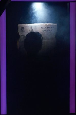 Roxie (Caitlin Wilayto) reading her headline in the paper @ BroadwayWorld Roxie (Caitlin Wilayto) reading her headline in the paper Photo