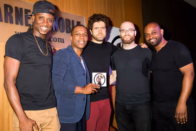 Leslie Odom Jr. with his band Photo
