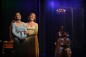 Jane Bennet (Chloe Tiso) gushes to her sister Elizabeth (Heather Botts) about the das Photo