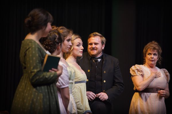 The Bennet sisters and their mother greet Mr. Collins (Zachary Tallman) as warmly as  Photo