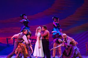 Laurey (Anne Horak) finds it difficult to resist Jud (Victor J. Wisehart) in her dream. @ BroadwayWorld Laurey (Anne Horak) finds it difficult to resist Jud (Victor J. Wisehart) in her drea Photo