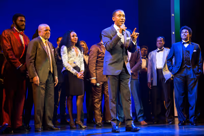 Charles Randolph-Wright and the cast of Motown Photo
