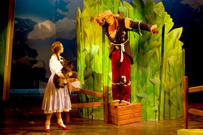 Stephen Petrovich (Scarecrow) with Devon Perry (Dorothy), and Dusty (Toto)  Photo