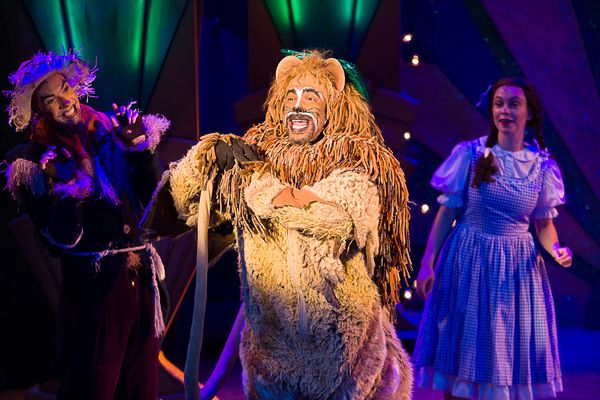 Richard E. Waits (Lion) with Stephen Petrovich (Scarecrow) and Devon Perry (Dorothy) Photo