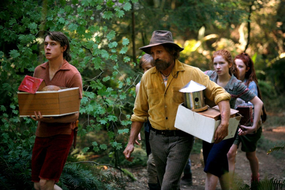 Left to right, George MacKay stars as Bo, Nicholas Hamilton as Rellian, Viggo Mortensen as their dad Ben, Annalise Basso as Vespyr and Samantha Isler as Kielyr in CAPTAIN FANTASTIC, a Bleecker Street release.Credit: Erik Simkins / Bleecker Street at 
