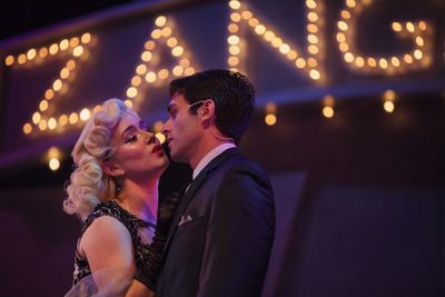 Bobby (Sam Lips) is just a tad resistant of his fiancee Irene's (LilyAnn Carlson) adv Photo