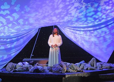 Jesus (Thaddeus Pearson) faces his fate in the garden of Gethsemane as the disciples  Photo
