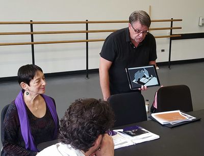 Chad McArver discussing scene design with Jane Kosminsky, and company Photo