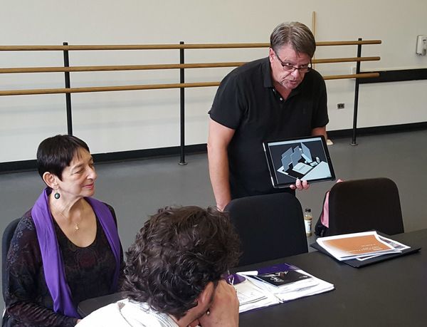 Chad McArver discussing scene design with Jane Kosminsky, and company Photo