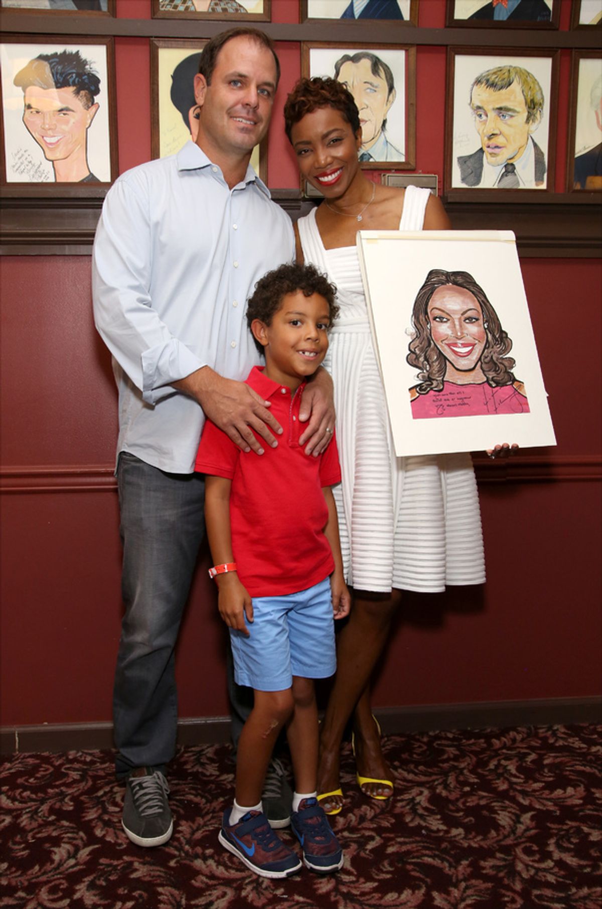 Healther Headley with her husband Brian Musso and son John David at THE COLOR PURPLE's Heather Headley Joins the Sardi's Wall of Fame!