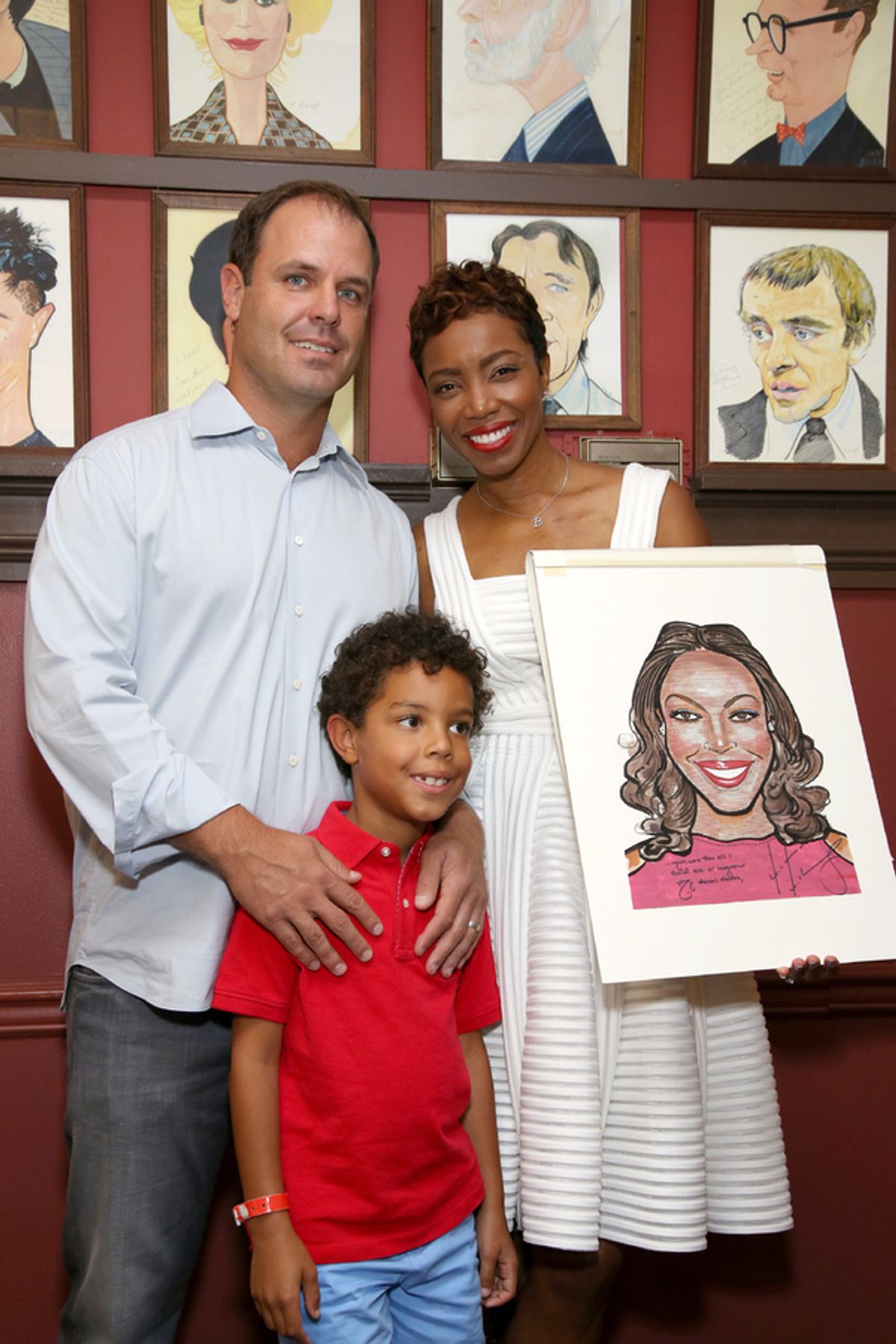 Healther Headley with her husband Brian Musso and son John David at THE COLOR PURPLE's Heather Headley Joins the Sardi's Wall of Fame!