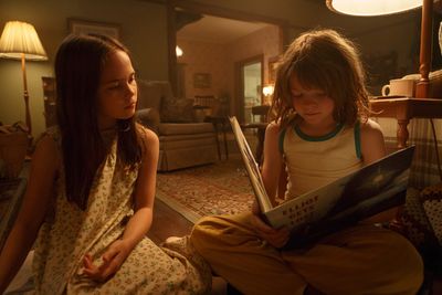 Oakes Fegley is Pete and Oona Laurence is Natalie in Disney's PETE'S DRAGON, the stor Photo