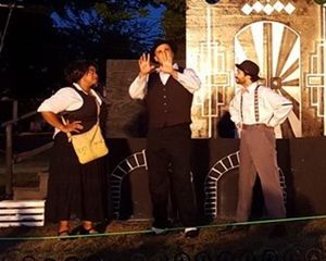 Elizabeth Reynolds (Courtesan), Enrique Rivera (Antipholus of Syracuse), and Mark Mas Photo