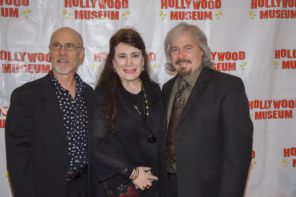 Donelle Dadigan posses on the red carpet with Barry and Stanley Livingston, real life Photo