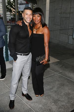 Actors Wilson Cruz and Angela Bassett Photo