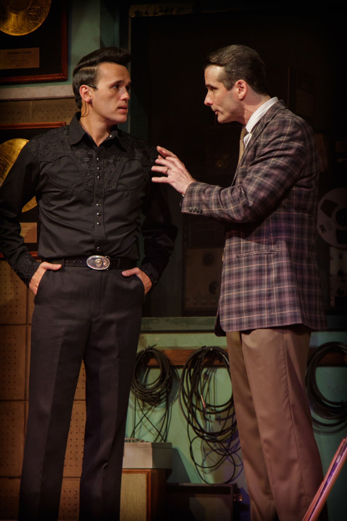 Johnny Cash (Justin Figueroa) and Sam Phillips (Luke Darnell) talk business at 