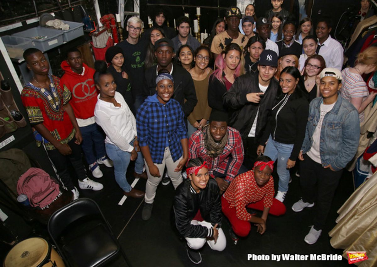 Cast member and moderator Okieriete Onaodowan  with student performers at 