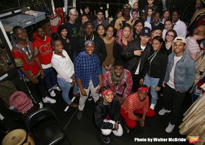 Cast member and moderator Okieriete Onaodowan  with student performers Photo