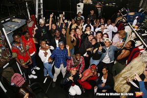 Cast member and moderator Okieriete Onaodowan  with student performers Photo