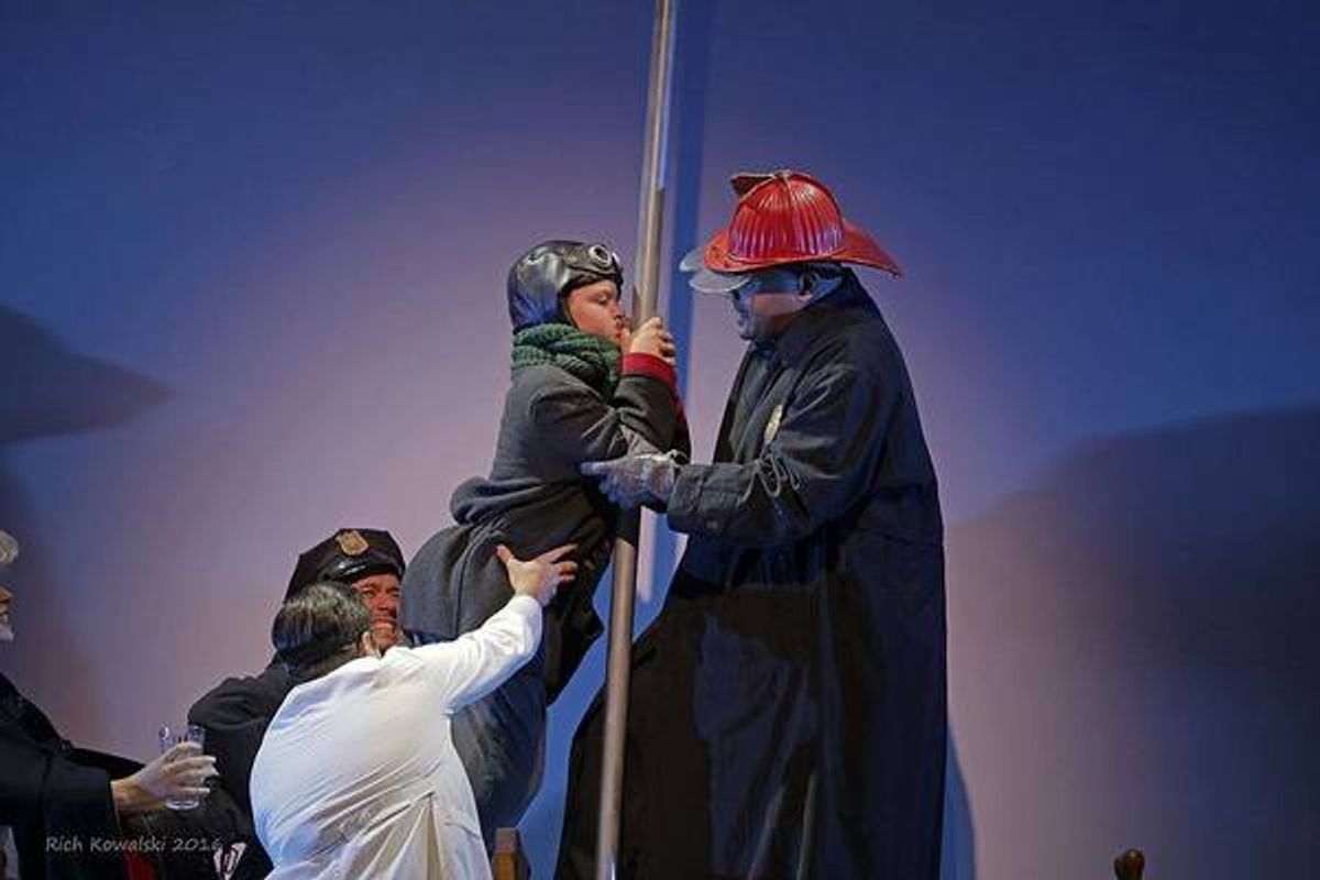 Itâ€™s a â€"sticky situationâ€ for poor Flick (played by Carl Smith) as the townspeople attempt to unstick his tongue in this famous flagpole scene in Phoenix Productionsâ€™ November revival of A Christmas Story.  at 