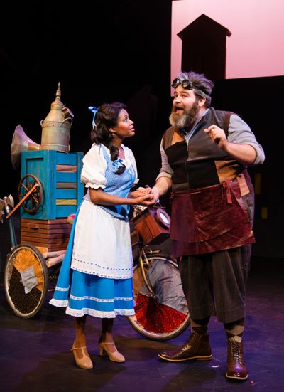 Belle (JANELLE LASALLE) encourages her inventor father, Maurice, (MATT STANDLEY) in B Photo