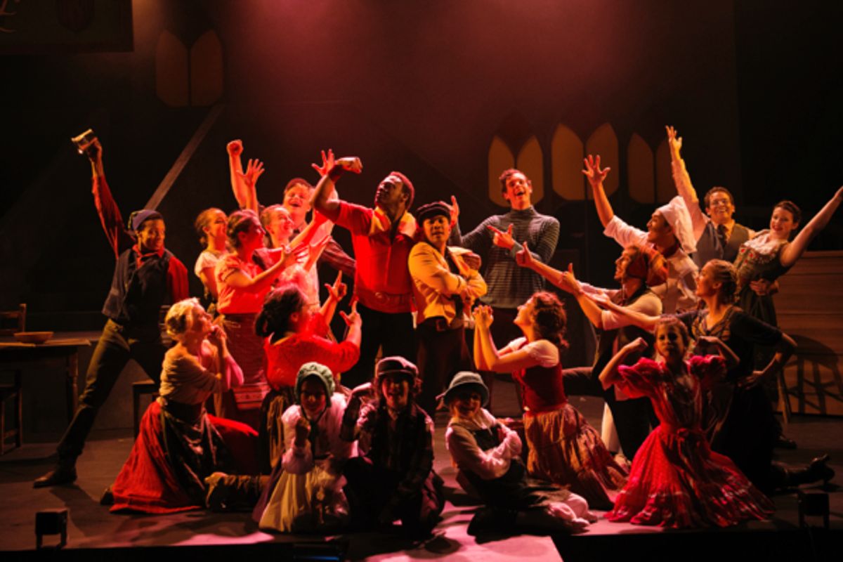 No one fights like Gaston (PHILLIP PERCY WILLIAMS); Le Fou (DOMINIC DAGDAGAN) and the cast fawn over Gaston in Berkeley Playhouse's production of Disney's Beauty and the Beast, directed by Kimberly Dooley. Performing at the Julia Morgan Theater now throug at 