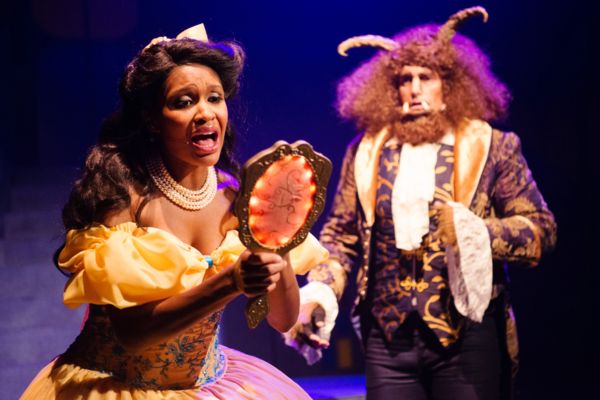 Belle (JANELLE LASALLE) discovers the Beast (TYLER MCKENNA*)'s dark secret in Disney' Photo