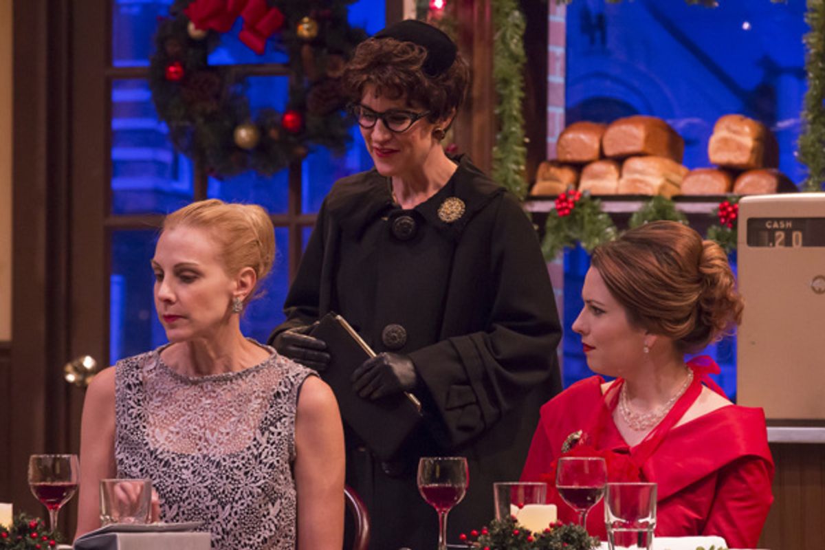Actors Elizabeth Marshall Black, Christy Watkins and Katie Fridsma star in A. D. Players' nostalgic Christmas drama O Little Town of Bagels, Teacakes and Hamburger Buns, playing through December 23 at Houston's Grace Theater. at 